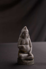 Vintage White Ceramic Seated Figurine with Hand-Painted Details