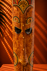 Handcrafted Wooden Tribal Mask with Intricate Traditional Carving