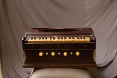 Vintage Wooden Harmonium with Ornate Brass Detailing