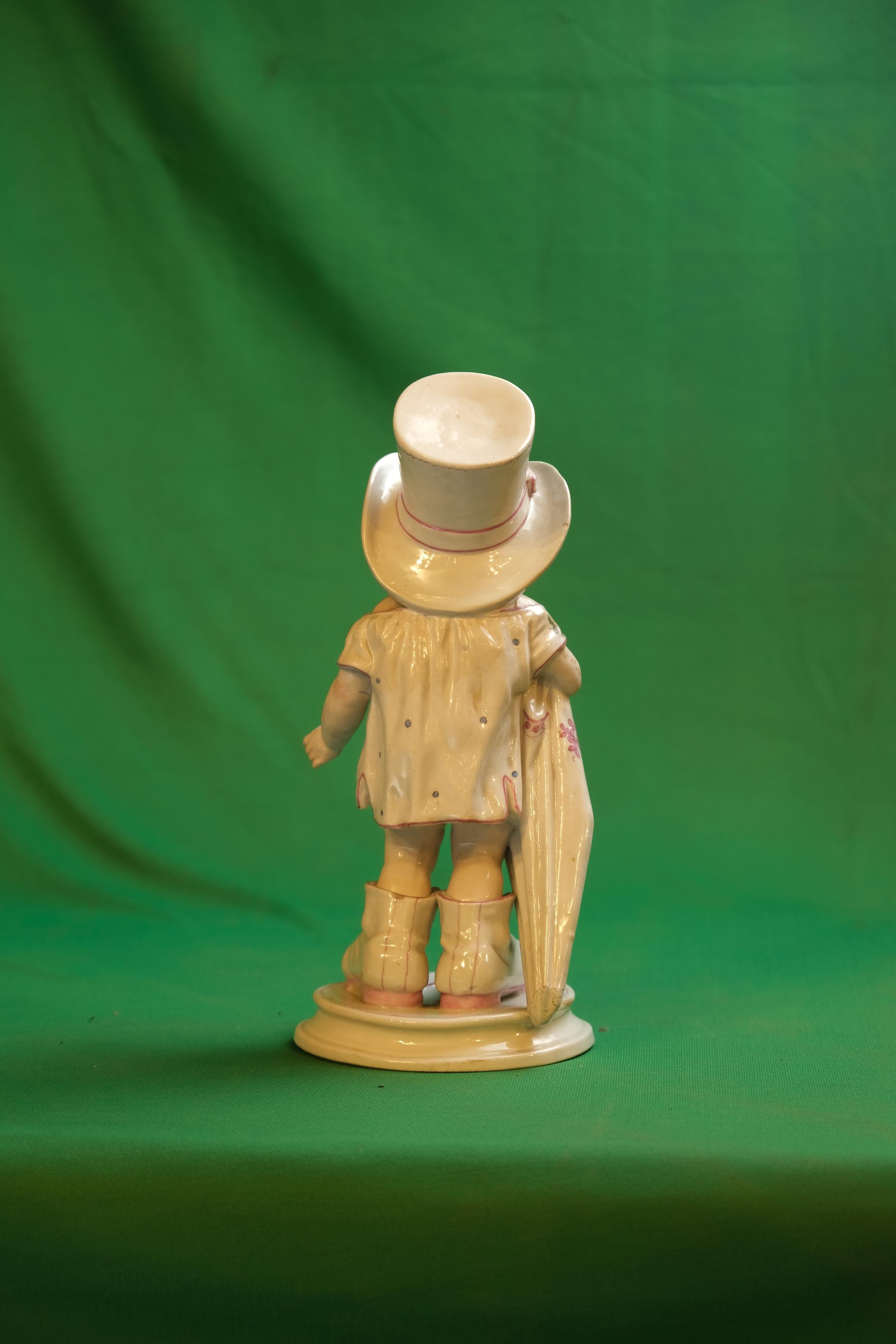 Gebrüder Heubach Porcelain "Papa's Boots" Figurine