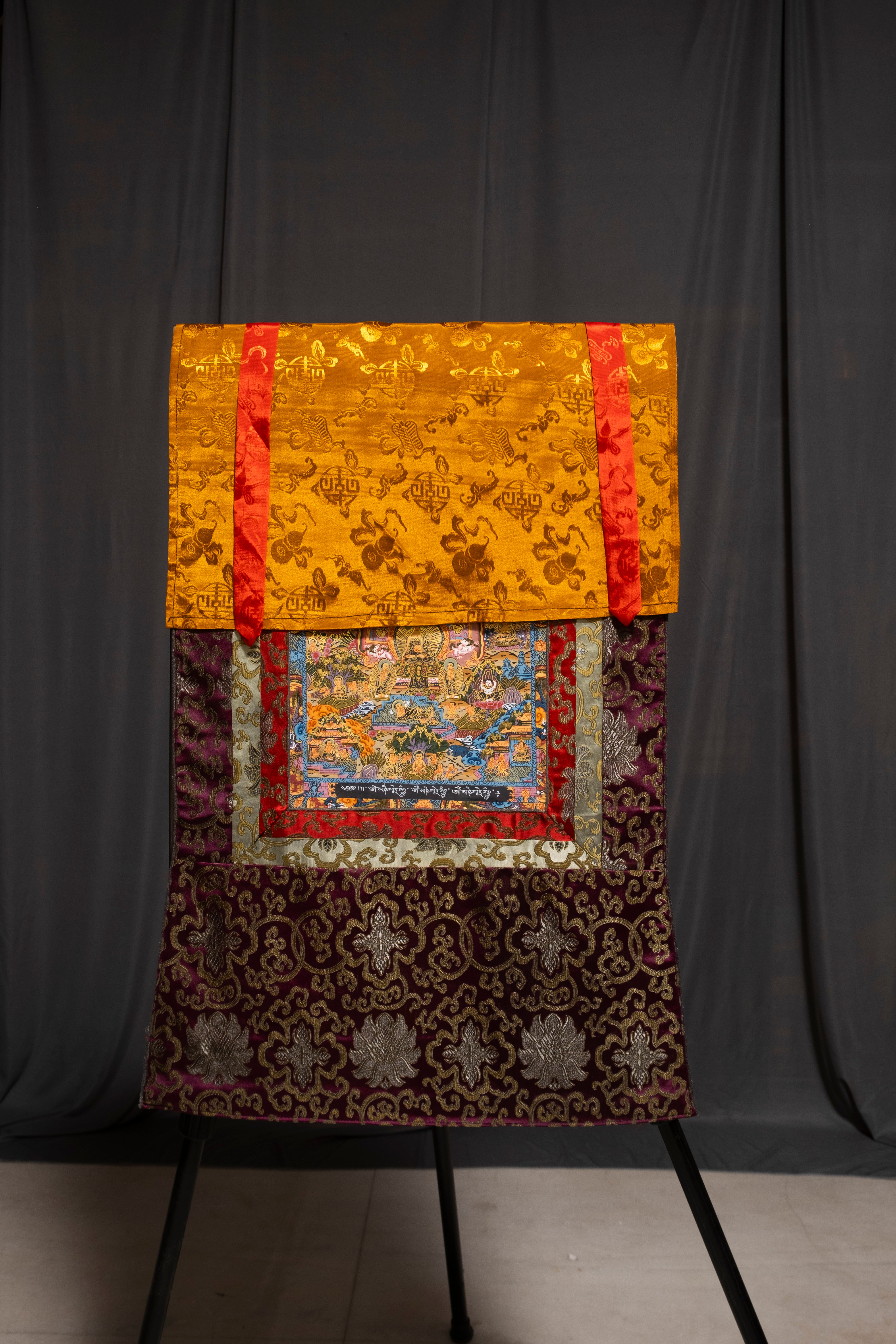 Traditional Tibetan Buddhist Thangka Tapestry with Ornate Brocade