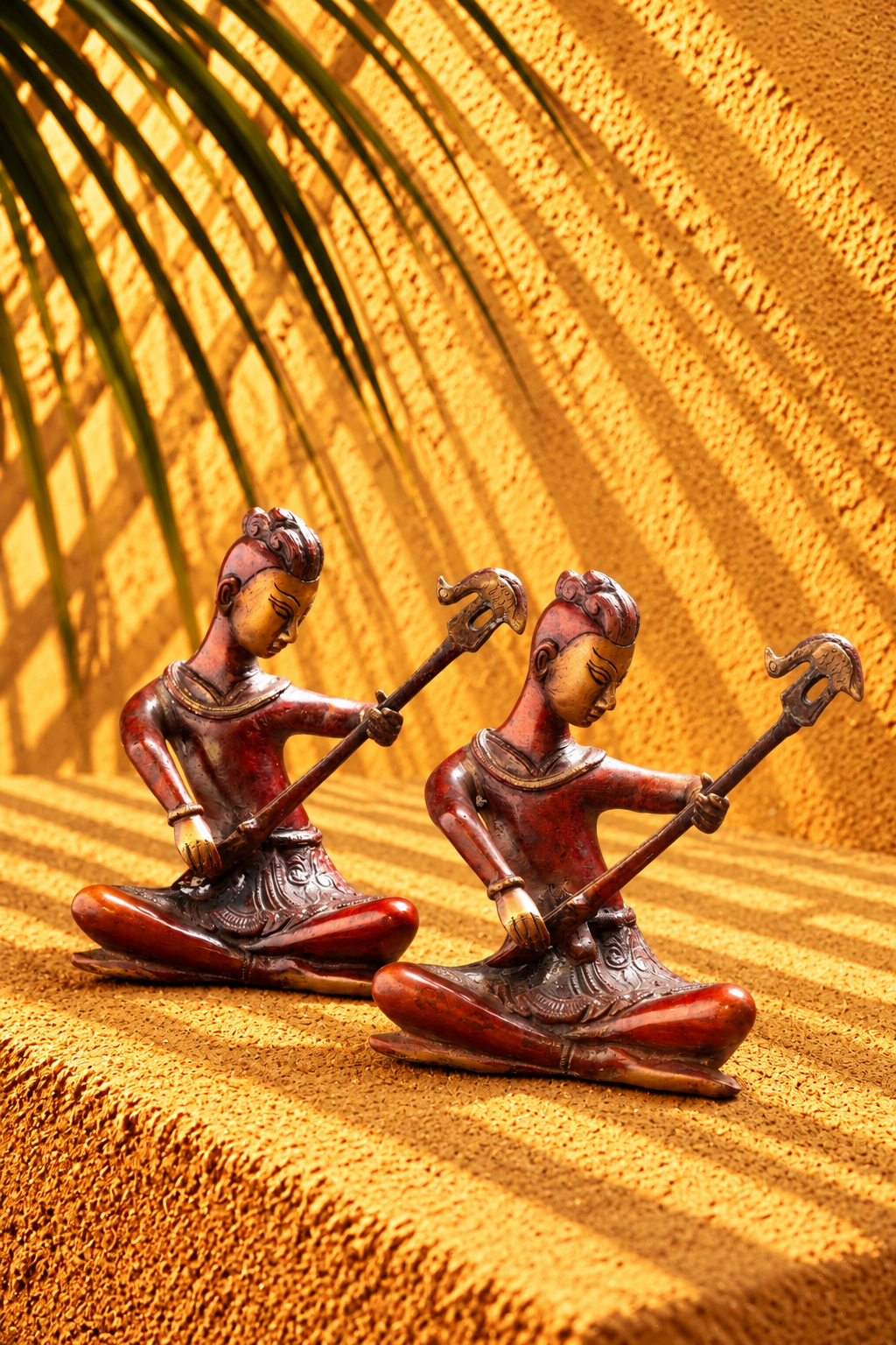 Pair of Traditional Seated Musician Figurines with Decorative Instruments