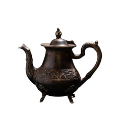 Antique Ornate Metal Teapot with Embossed Floral Detailing