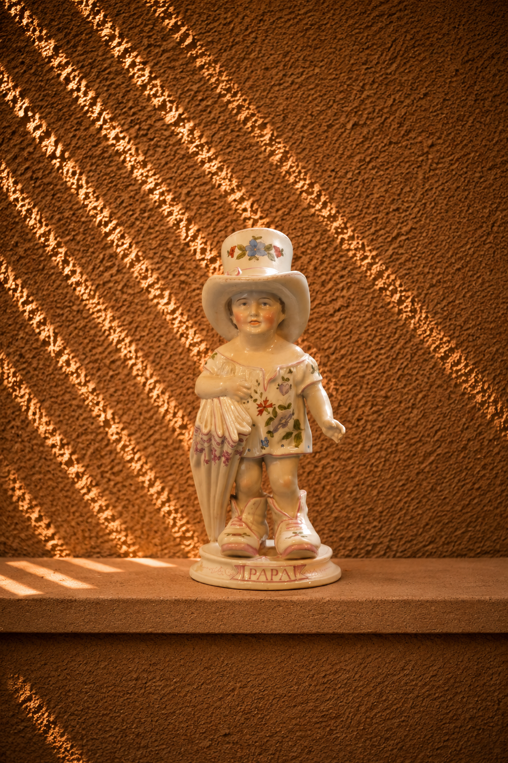 Gebrüder Heubach Porcelain "Papa's Boots" Figurine
